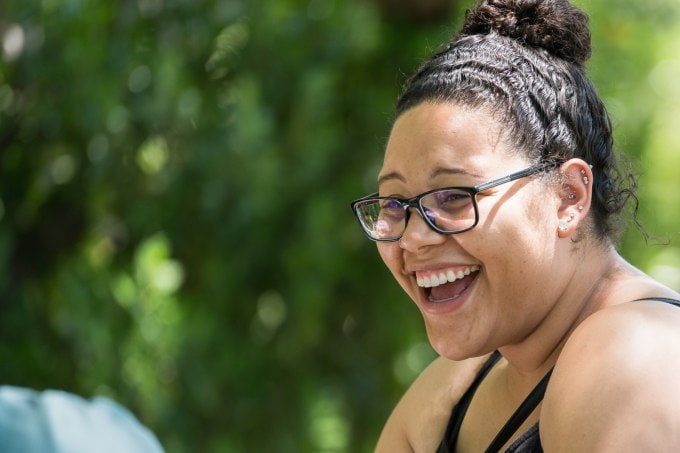 lub member laughing in the RM tasting room garden